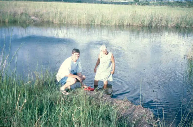 Tolla Lombard and Manuela Lopes by the river on the Lopes farm in Menongue.